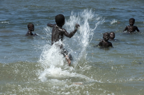 ART PRINTS SHOP - India. Andaman Islands. The Jarawa Chronicles. Children playing in the sea.
