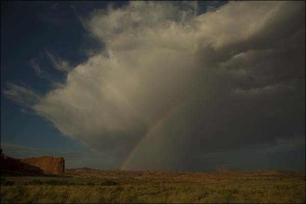 For Sale - Rainbow in thunderstorm, Arches National Park, Utah.