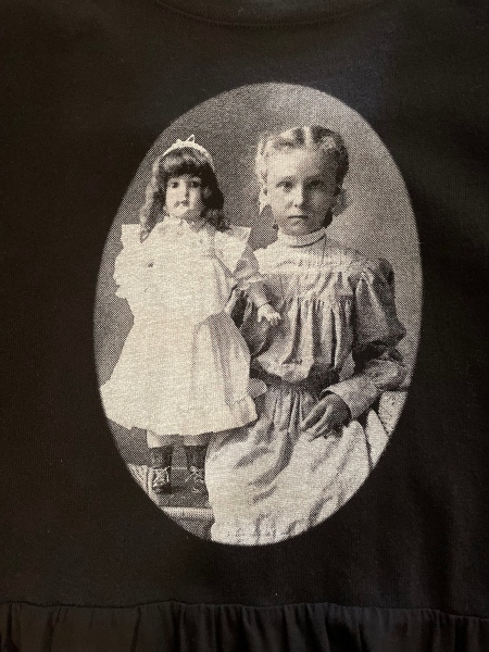 STORE - Black Dress With Ruffle Skirt Silkscreened with Vintage Photograph of a Girl Posting With A Doll