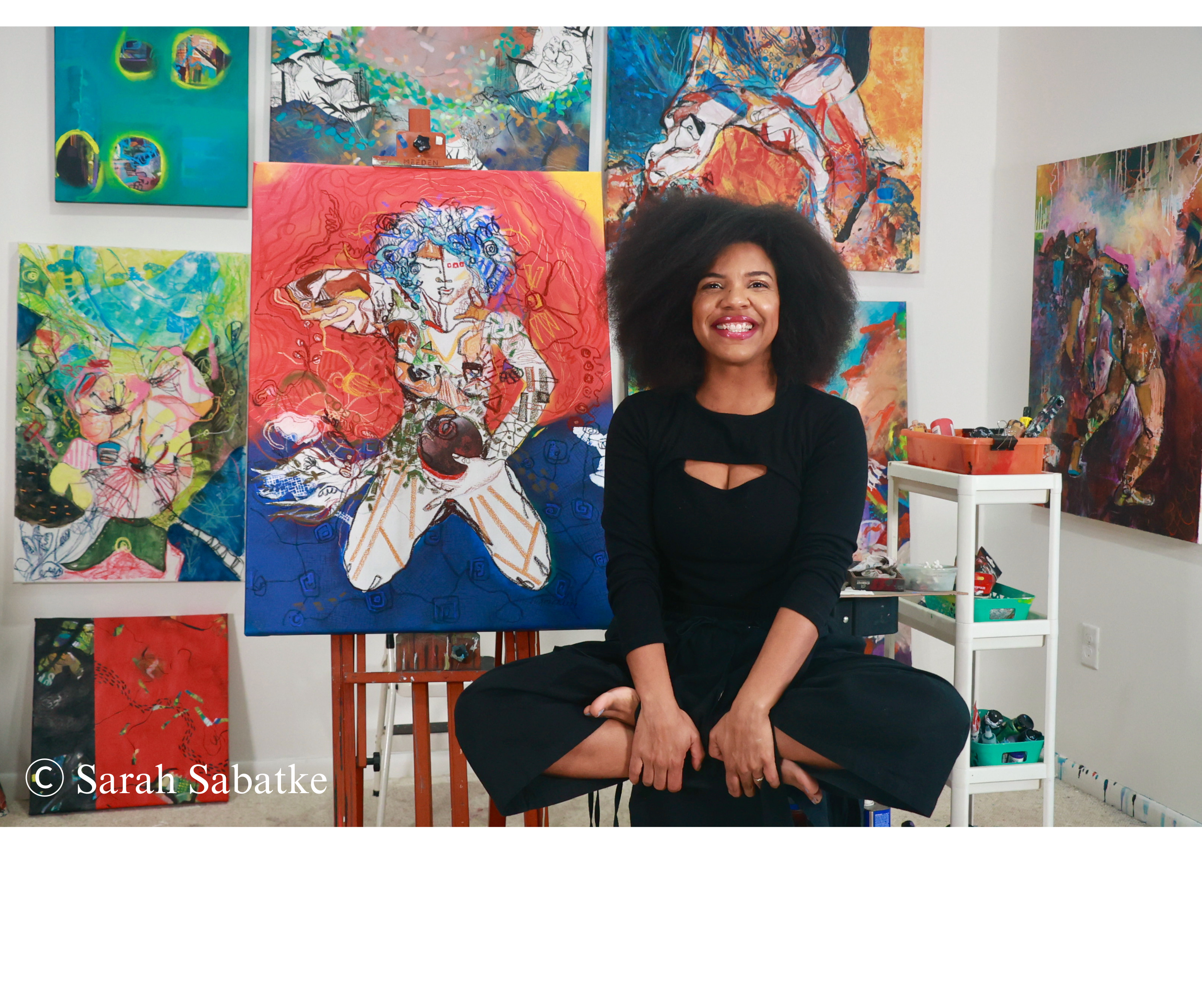  Local artist LUSMERLIN poses for a portrait in her home...